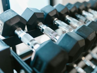 Close up of steel dumbbells in a modern sports club